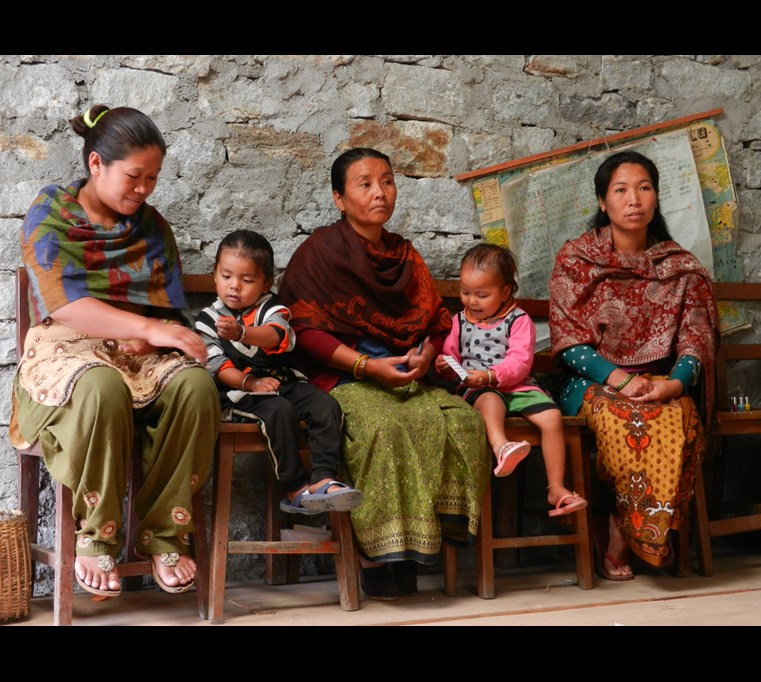 Teachers and children in Odargaun school